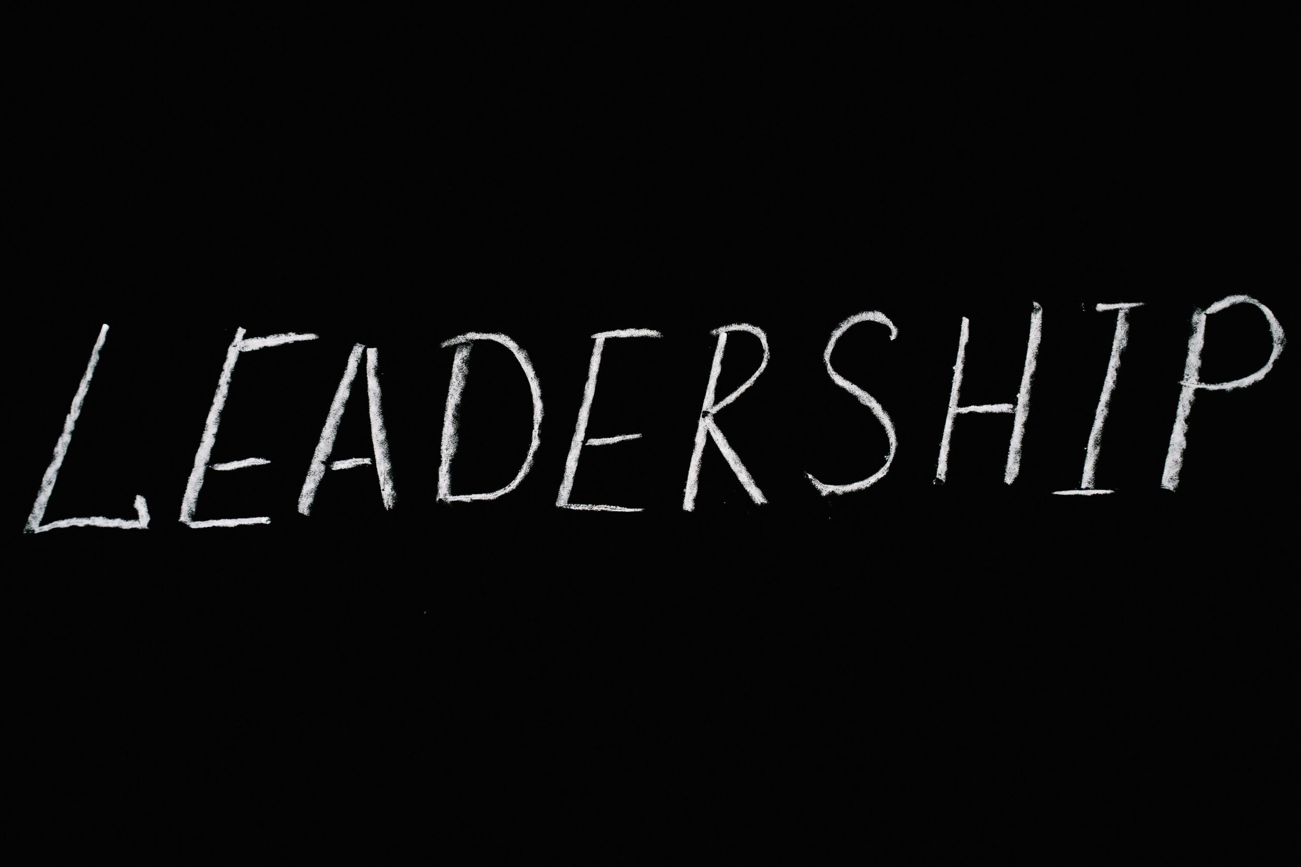 Leadership lettering text on black background